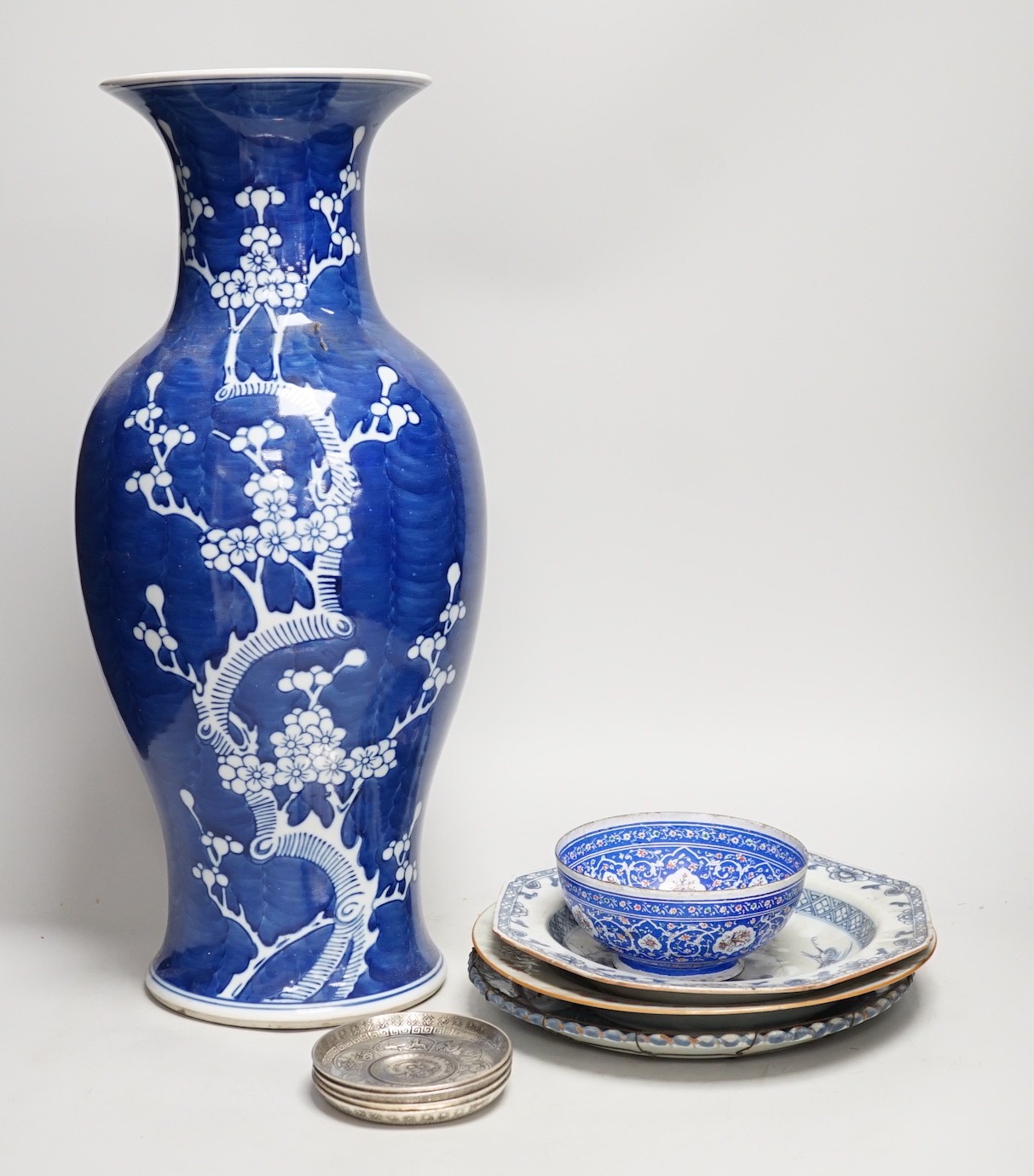 A large Chinese blue and white prunus vase, 46.5cm, together with Chinese export plates and oriental ceramics etc